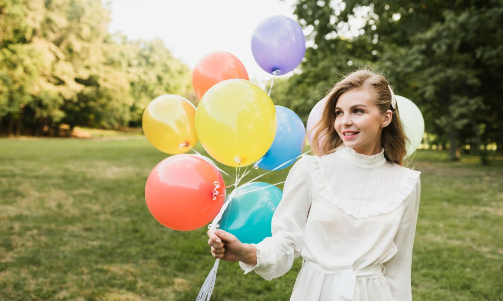 birthday girl celebrating outdoor shot